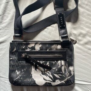 L.A.M.B. Crossbody Bag black and white roses